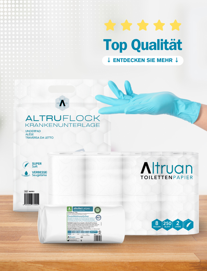 Eine Packung Altruaflock-Unterlagen und eine Packung Altruan-Toilettenpapier sind auf einer Holzfläche ausgestellt. Auf der rechten Seite ist eine behandschuhte Hand zu sehen, darüber ein