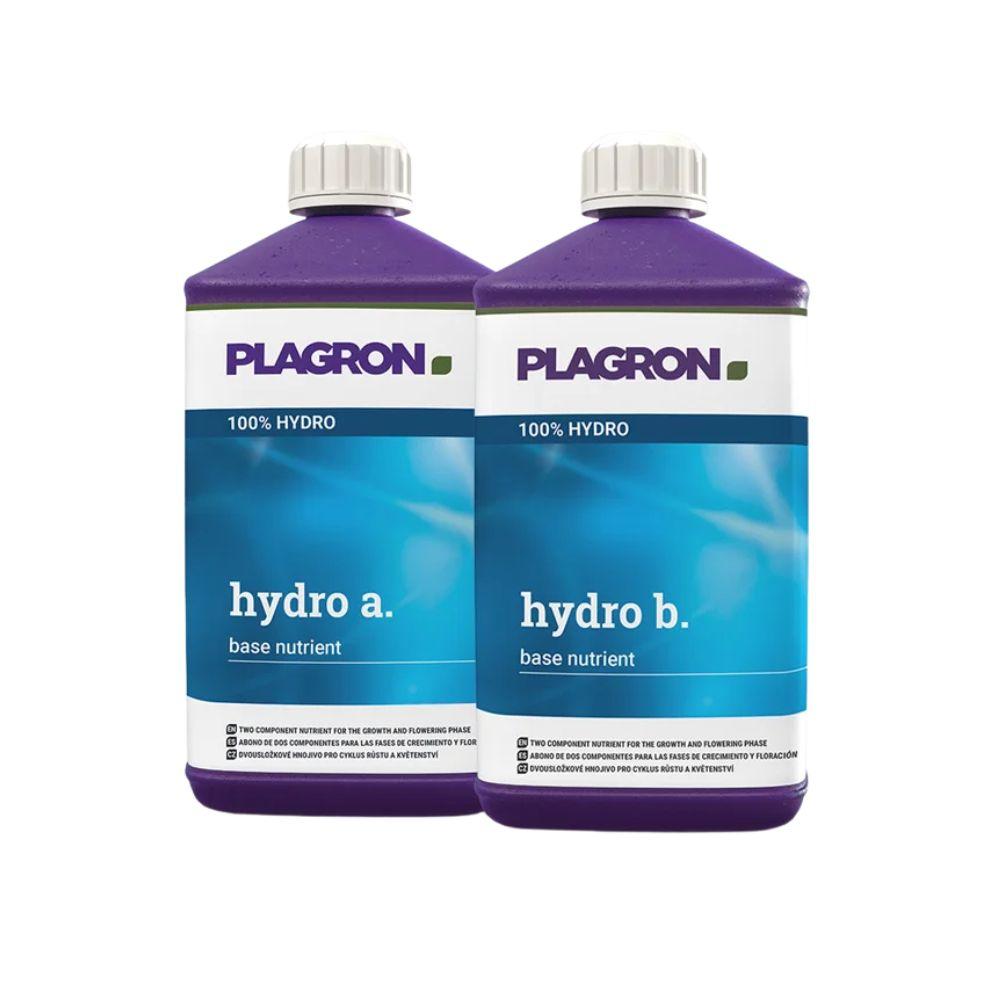 On a white background are two plastic bottles Plagron Hydro A + B by Bertels B.V., two-component fertilizer for the flowering phase, for inert substrates, with purple caps and blue-white labels depicted.