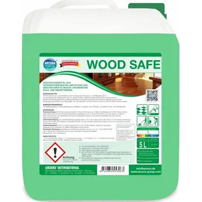 A green 5-liter plastic container labeled "Arcora WOOD SAFE WISCHPFLEGE" from Arcora International GmbH contains usage instructions, safety information, a photo of the wooden floor, and points out the care of oiled or oil/wax treated wood and parquet floors.