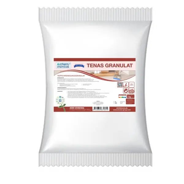 A white plastic packaging labeled "Arcora TENAS GRANULAT CARPET CLEANING GRANULATE WITH ENCAPSULATION SYSTEM" from Arcora International GmbH displays images and details about carpet cleaning and highlights the encapsulation system for effective carpet care.