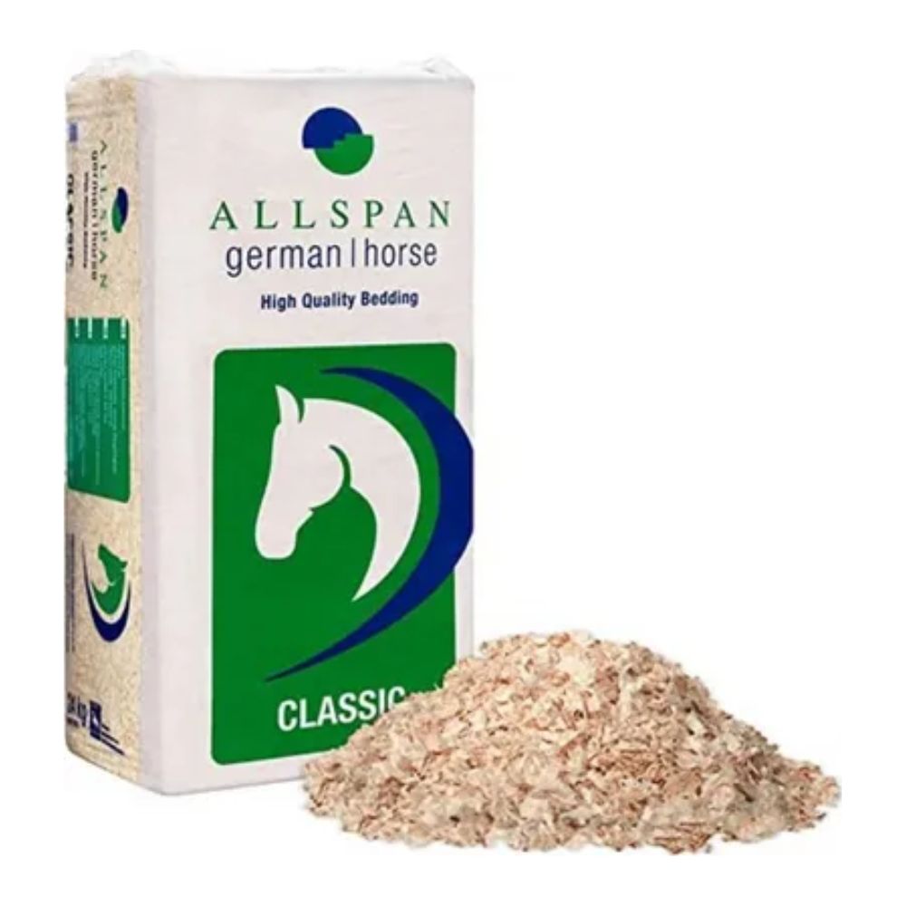 An Allspan German Horse Classic wood shavings bedding, known for its high level of dryness, stands next to other bedding. The packaging shows a stylized horse head and 'Classic'.