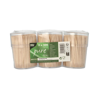 Three transparent dispensers, each with PAPSTAR wooden toothpicks "pure" round (6.7 cm), are shrink-wrapped together. The green label shows "3 x 500" toothpicks (a total of 1500 pieces) and is provided with the logo of PAPSTAR GmbH and product information.