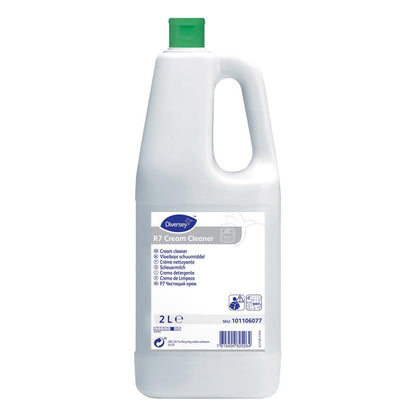 A white 2-liter plastic bottle of Diversey R7 cream cleaner for hard, waterproof surfaces from Diversey Deutschland GmbH & Co. OHG, with a green cap and multilingual instructions on the label.