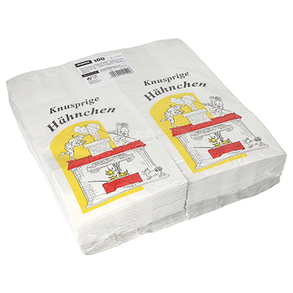 A stack of Starpak 100 chicken bags, paper with aluminum lining, shows white bags with a yellow-red chicken illustration and the inscription "Crispy Chicken." The eco-friendly Starpak bags are topped with a product label.
