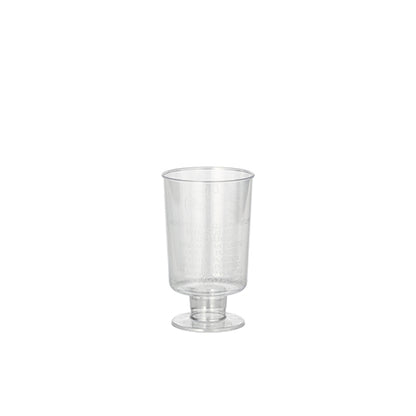 The Starpak 20 stem glasses for white wine, made of crystal-clear polystyrene, impress with their elegant design in the style of classic white wine glasses. The glass stands on a wide base with a short stem against a neutral, white background.