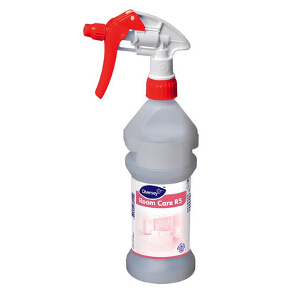 A "Room Care R5 Plus spray bottle, empty" from Diversey Deutschland GmbH & Co. OHG with a red spray nozzle and white-blue label, designed for use with room cleaning solutions.