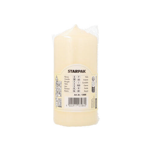 A cream-colored Starpak pillar candle (Ø 60 mm, 130 mm) with extra long burning time is wrapped in plastic and shows the brand name, product details, and barcode on a plain white background.