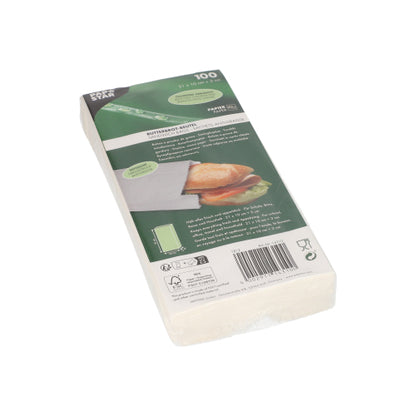 Eine versiegelte Packung PAPSTAR Butterbrotbeutel fettdicht, 21x10x3 cm, weiß (100 Stück) der PAPSTAR GmbH, mit einem Frontetikett mit Produktangaben, Barcode und der Abbildung eines Sandwiches in der Schrumpffolie.