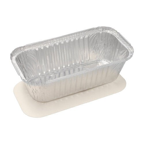 A rectangular, disposable aluminum Starpak 10-tray pan with a PP coating and a snap-on lid featuring wavy edges and a smooth surface sits on a white cardboard base—perfect for storing food.