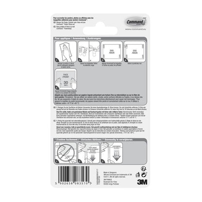 Back of a package of Command™ Poster Strips 17024 from 3M Deutschland GmbH with illustrated step-by-step instructions for residue-free mounting and poster attachment in multiple languages, with diagrams, barcode, and 3M branding at the bottom right.