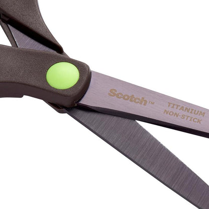 Close-up of a 3M Deutschland GmbH Scotch™ titanium scissors, 20 cm, with non-stick titanium blades and a green, circular detail near the handle joint.