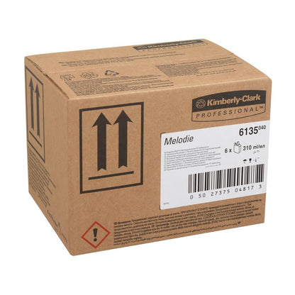 A brown box labeled "Kimberly-Clark Professional™ fragrance MELODY - Refill Pack / Transparent / 310 ml - 6 Cartridges" from Kimberly-Clark GmbH, with product information, barcode, handling symbols, and marked for long-lasting freshness.
