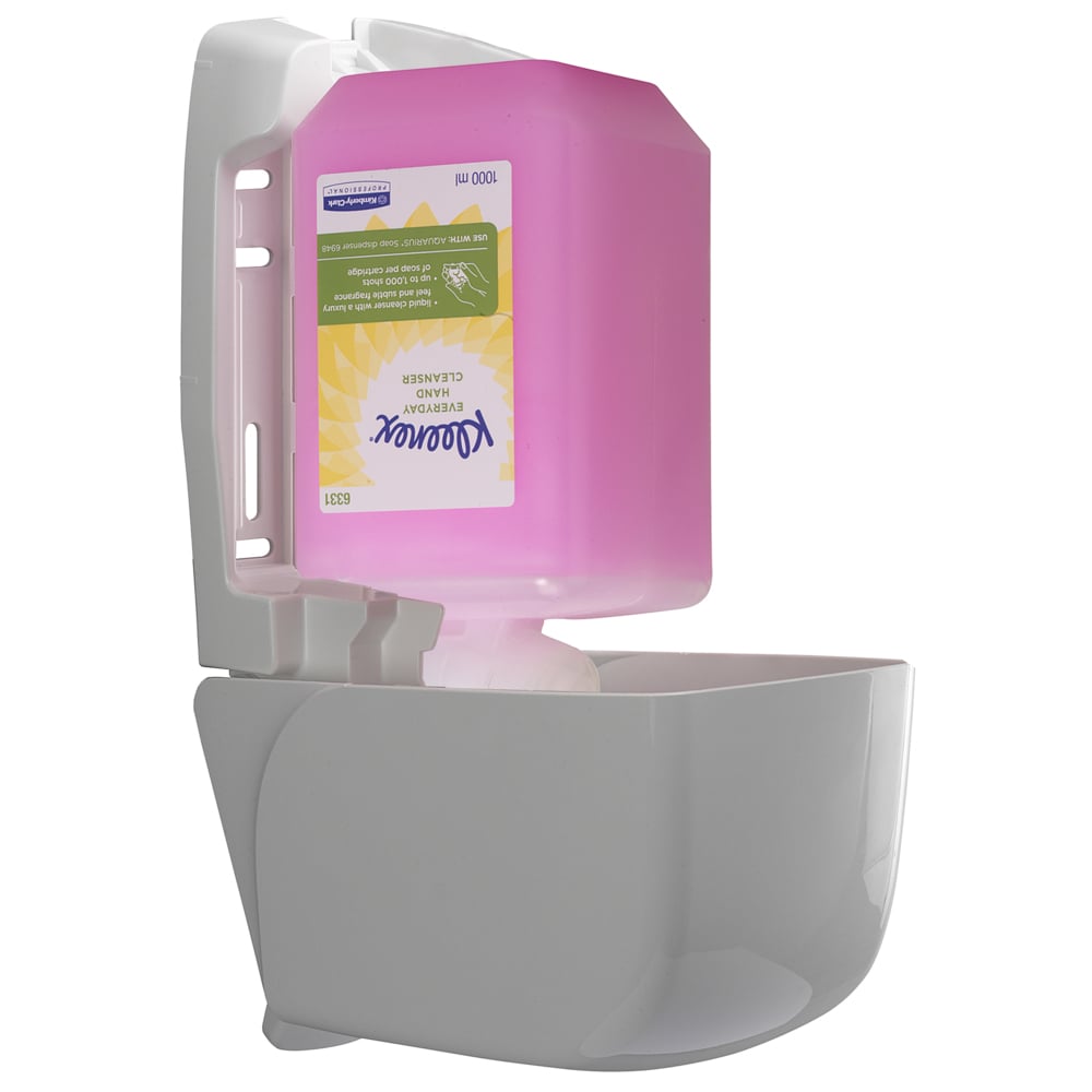 A white wall dispenser from Kimberly-Clark GmbH holds an open 1L Kleenex® Normal Wash Lotion refill cassette (pink), with the refill visible inside.