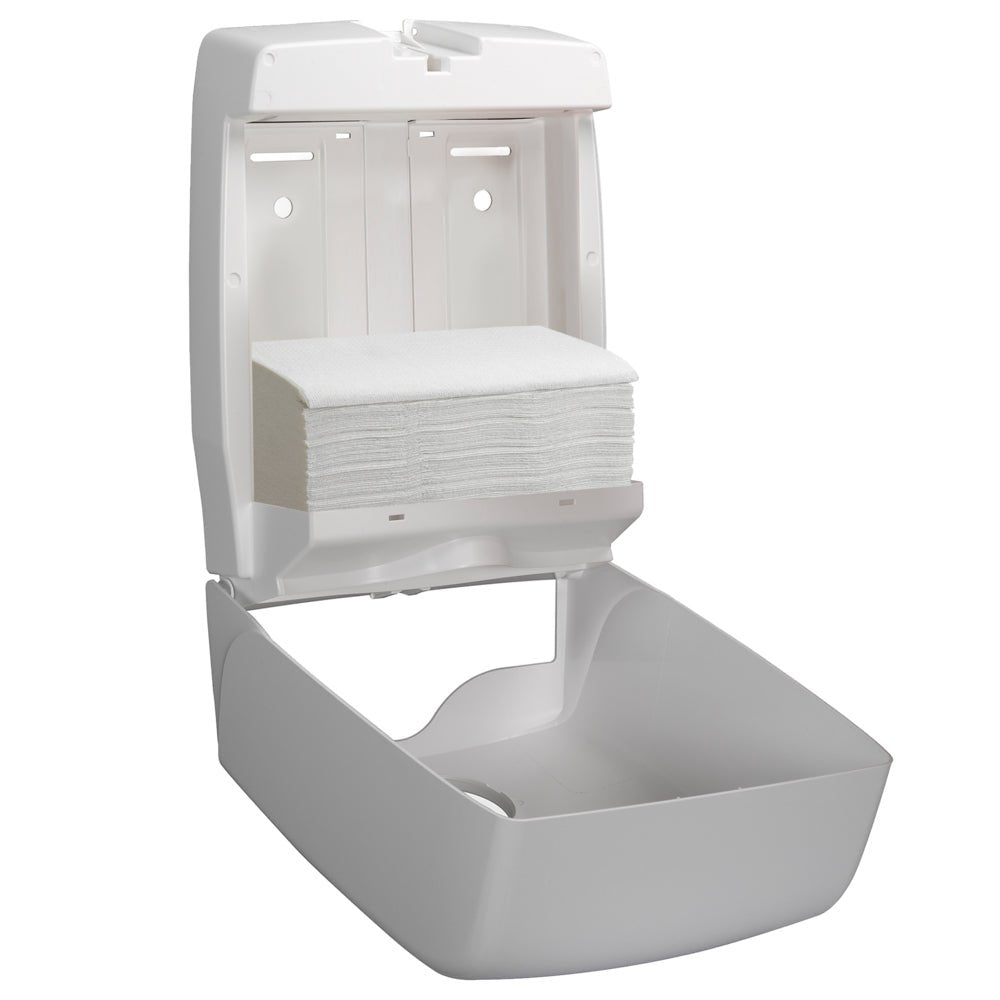A white wall dispenser is open, showing a stack of Hostess™ NATURA™ towels (folded, white, large), from Kimberly-Clark GmbH - ideal for easy paper towel dispensing in public washrooms. Box: 20 clips x 84 sheets.