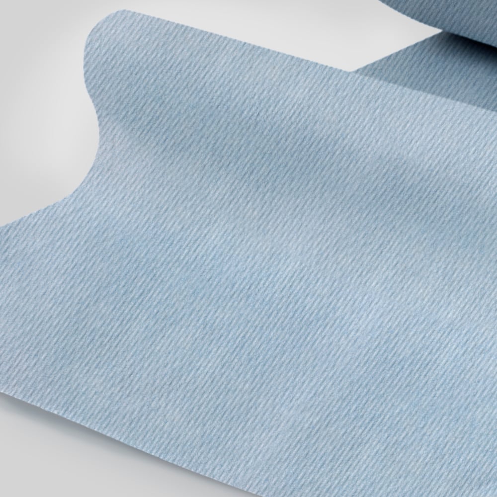 A close-up of the Kimberly-Clark GmbH WypAll® L10 paper towel for surfaces - large roll (38.00 cm x 23.50 cm), light blue with a subtle diagonal stripe texture, partially unrolled on a flat surface.