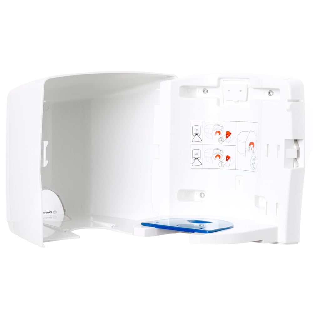 The opened Aquarius™ towel dispenser - Roll Control (white) by Kimberly-Clark GmbH reveals its compartments and an internal instruction diagram with pictures and red arrows for hygienic cleaning.