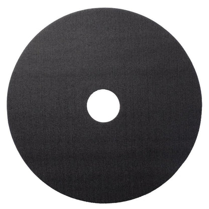 On a white background, a black, round floor polishing pad with a central hole is depicted, designed for use with the Twister Hybrid Holder (holder for the Twister Hybrid Tool) by Diversey Deutschland GmbH & Co. OHG for efficient cleaning.