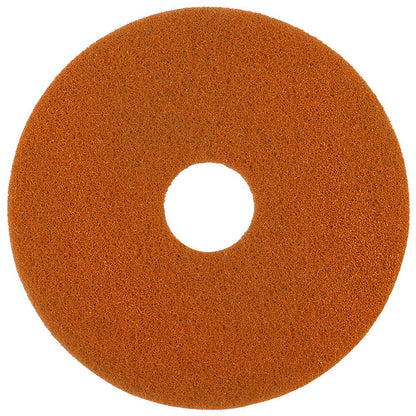 The Twister Pad orange for stone floors by Diversey Deutschland GmbH & Co. OHG is a round, orange, textured pad with a hole in the center, designed for floor cleaning with microscopic diamonds – ideal for use with polishing machines or polishers.