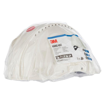 A stack of 3M Deutschland GmbH G3000C Uvicator safety helmets, packaged in transparent plastic with a visible label indicating brand, product information, safety certifications, and a Uvicator sensor for enhanced protection.