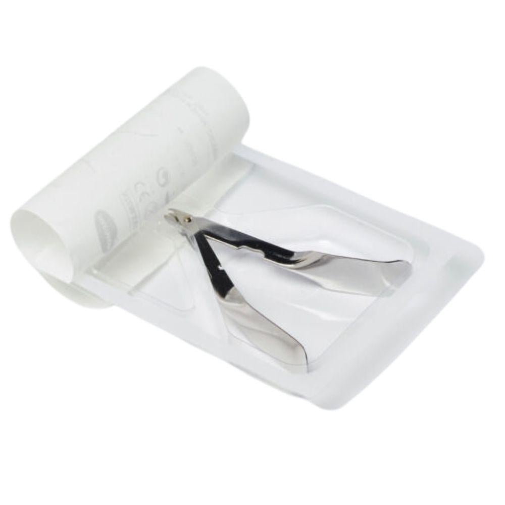 The Hartmann MediSet® staple remover (by Paul Hartmann AG) is individually sterile packaged and sealed in a clear packaging with a partially unrolled white paper backing. The background is white.