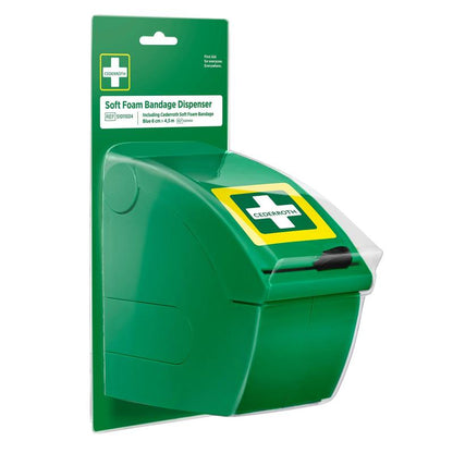 The Cederroth soft foam bandage dispenser blue from Orkla Wound Care AB is a blue dispenser on a backboard with the inscription "Soft Foam Bandage Dispenser". With a pull-down front and cross symbol, it is ideal for quick initial care with self-adhesive bandages.