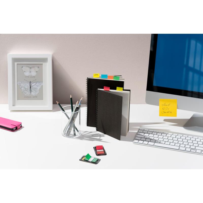 A tidy desk with two Post-it® Index Tabs marked by 3M Deutschland GmbH in various colors-perfect for organizing documents. Includes 10 dispensers plus 2 free, each with 50 standard tabs, size 25.4 mm x 43.2 mm.