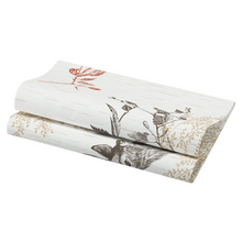 A folded piece of fabric with a nature-inspired design of leaves and flowers in shades of red, brown, and beige reflects the elegance of a Duni Bio Dunisoft® napkin. Suitable for home decoration like curtains or upholstery.