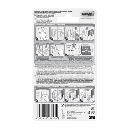 The Command™ Strips 17021B, waterproof (Size M, 10/pack) from 3M Deutschland GmbH feature illustrated application instructions, safety instructions, multilingual text, barcode, and the 3M logo - ideal for mounting without drilling in the bathroom.