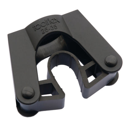 A black plastic pipe clip, TASKI Toolflex handle holder from Diversey Deutschland GmbH & Co. OHG, with a curved middle slot that securely holds cylindrical handles or cleaning tools in place.