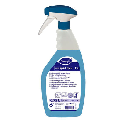 A white and blue spray bottle TASKI Sprint Glass glass and surface cleaner from Diversey Deutschland GmbH & Co. OHG, 0.75 l, for streak-free cleaning, with product information and instructions for use on the label.
