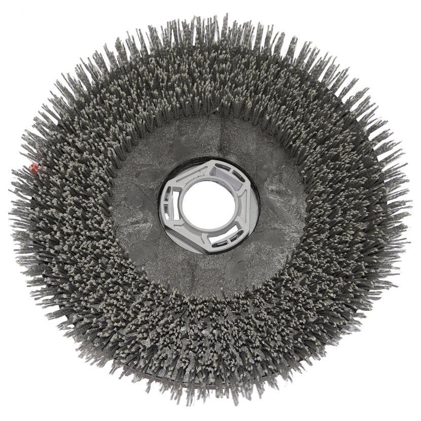 The close-up of the abrasive scrub brush (38 cm) from Diversey Germany for swingo XP R shows densely packed, stiff bristles evenly arranged around a central plastic mounting hole. Package: 1 piece.
