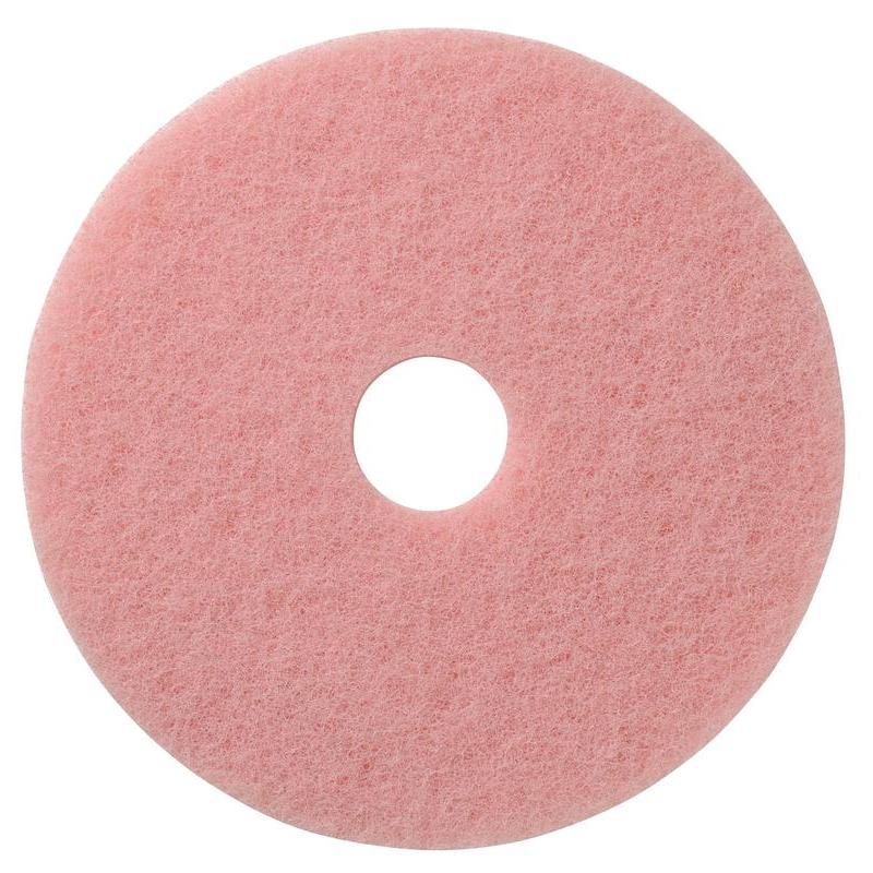 The pink, round TASKI Americo Remover Pad Kombipad for cleaning and polishing from Diversey Deutschland GmbH & Co. OHG has a rough texture and a hole in the middle, viewed from above on a white background.