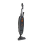 The TASKI AERO UP Li-Ion from Diversey Germany is a black, upright, battery-powered brush vacuum with a telescopic tube, two orange top buttons, a rectangular base, and a handheld suction for small to medium areas - including a brush and crevice nozzle.