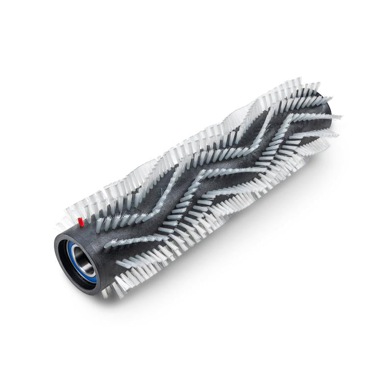 The TASKI Ultimaxx roller brush for exposed aggregate concrete (45cm) from Diversey Deutschland GmbH & Co. OHG is a replacement roller brush, designed with white chevron bristles and a black core, suitable for the TASKI Ultimaxx RB series.
