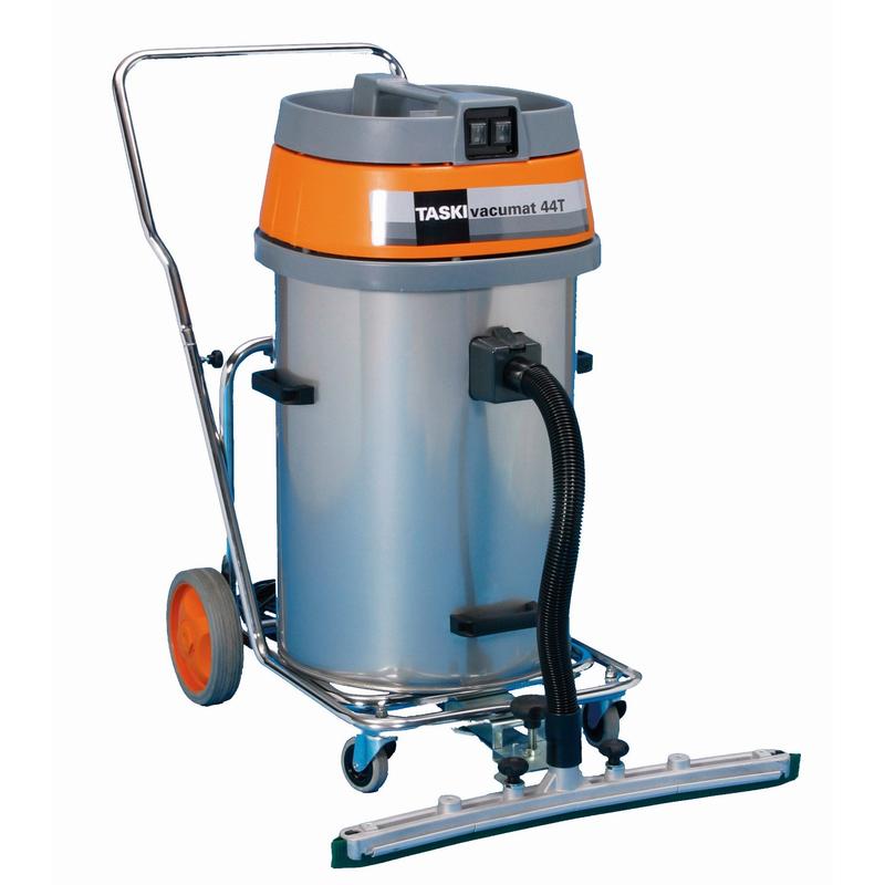 The TASKI vacumat 44 T from Diversey Deutschland is a powerful wet and dry vacuum cleaner with a stainless steel housing and tipping chassis in orange/grey design, with a chassis, hose, and wide floor attachment. Packaging: 1 piece.