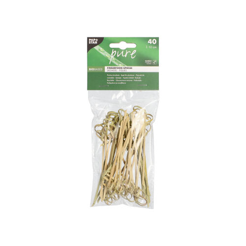 In a transparent plastic bag are 40 PAPSTAR 40 finger food picks "pure" bamboo skewers from PAPSTAR GmbH with loops at the ends and a green label emphasizing environmental friendliness - perfect for serving finger food.