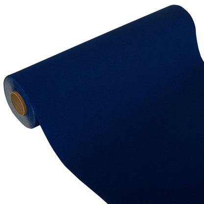 A partially unrolled PAPSTAR table runner, Tissue "ROYAL Collection" (24 m x 40 cm) from PAPSTAR GmbH in dark blue, with the cardboard core visible at one end, is presented against a white background.