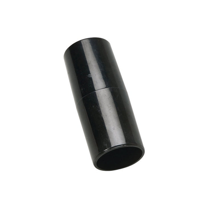 The TASKI cone piece | Pack (1 piece) from Diversey Deutschland GmbH & Co. OHG is a black, cylindrical plastic pipe connector, perfect for cleaning accessories and surface cleaning, shown angled on a white background.