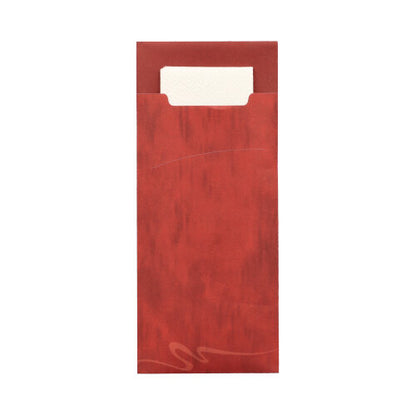 A red rectangular PAPSTAR 520 cutlery pouch (20 x 8.5 cm) from PAPSTAR GmbH with a subtle swirl pattern and partially opened, allowing a view of the matching white 2-ply napkin (33 x 33 cm) inside.