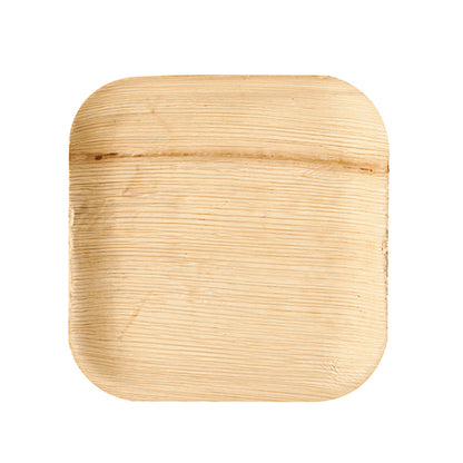 The PAPSTAR 25 plate palm leaf "pure" from PAPSTAR GmbH is a square, flat, light brown palm leaf plate with rounded corners and visible grain – an eco-friendly choice for special occasions, depicted against a white background.