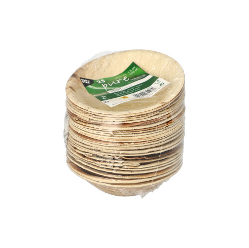 A stack of 25 PAPSTAR bowls, palm leaf "pure" round, from PAPSTAR GmbH, packaged in foil with green-white label. These eco-friendly disposable bowls have a natural look - perfect for sustainable events.
