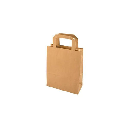 A PAPSTAR 50 carrier bag, paper with handle from PAPSTAR GmbH stands upright against a white background, featuring a flat rectangular handle and an eco-friendly paper design.