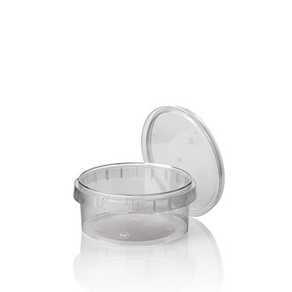 A round, transparent Starpak 50 deli cup made of PP with original seal and matching lid, slightly opened and resting against the container, is presented on a white background with a subtle reflection.