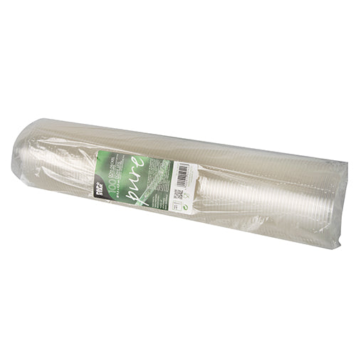 A rolled stack of transparent PAPSTAR 100 dome lids, PLA "pure" round lids (Ø 9.5 cm, 4.5 cm), from PAPSTAR GmbH, wrapped in transparent packaging with a green-white label with product information.