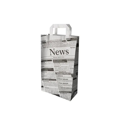 The eco-friendly PAPSTAR 50 carrier bags made of paper with handle from PAPSTAR GmbH in the design of a newspaper ad with the word "News" on the edge stands against a white background.