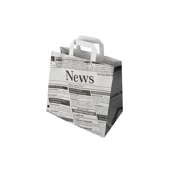 The PAPSTAR 50 carrier bags from PAPSTAR GmbH are eco-friendly paper bags with handles, featuring a black-and-white newspaper motif with headlines and articles on a white background.