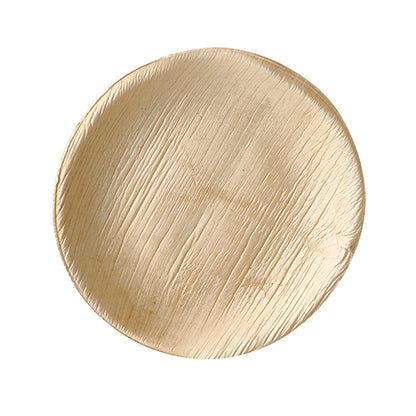 A round, light brown PAPSTAR 25 plate palm leaf "pure" plate from PAPSTAR GmbH with a textured surface, viewed from above on white - biodegradable and environmentally friendly disposable tableware for sustainable table culture.