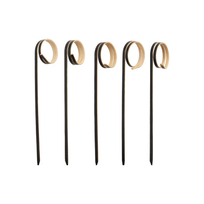 Five PAPSTAR 100 Fingerfood - Picks from PAPSTAR GmbH, each with a wavy spiral, are arranged vertically on a white background - ideal for stylishly serving finger food at parties.