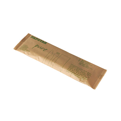 A brown rectangular paper package with the inscription "PAPSTAR Pure" from PAPSTAR GmbH contains 50 wooden cutlery sets with napkins. The eco-friendly packaging is adorned on the front with green text and line drawings of a fork, knife, and napkin.