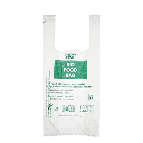 A transparent bio-film bag with the inscription "BIO FOOD BAG" with green text from PAPSTAR GmbH. This environmentally friendly shirt carrier bag is biodegradable, compostable, and comes as a roll of 100 knot bags.